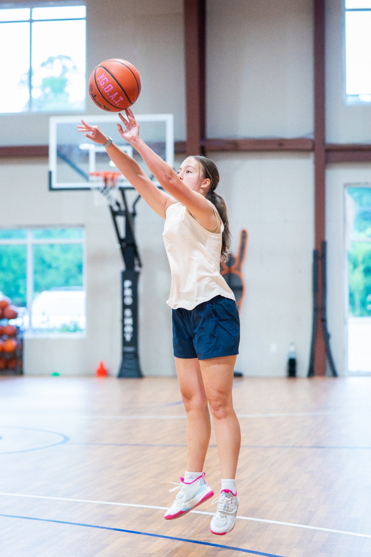 Player elevating for a jump shot with perfect follow-through form